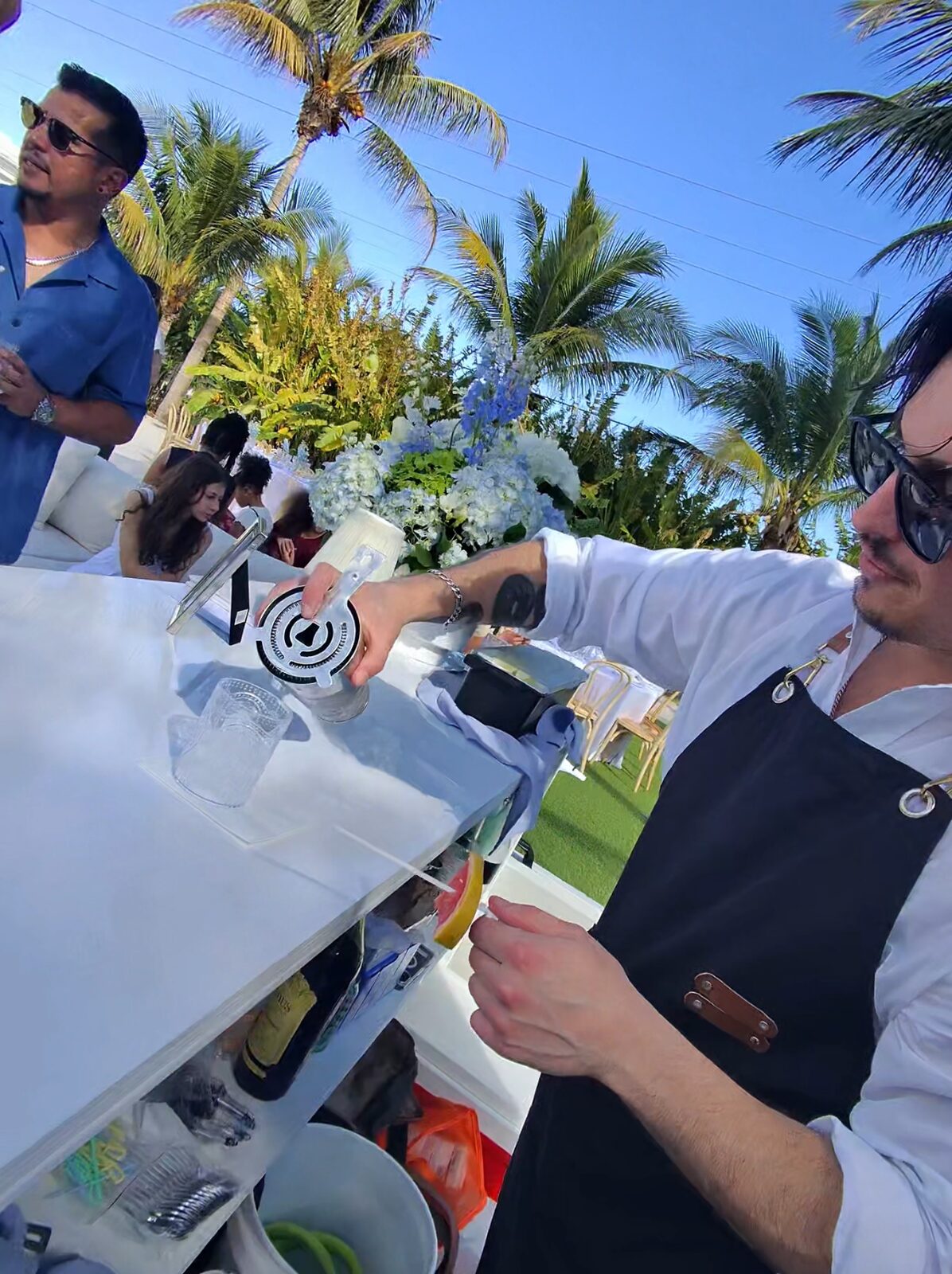 Bartender pouring a fresh cocktail at a private Palm Beach County event