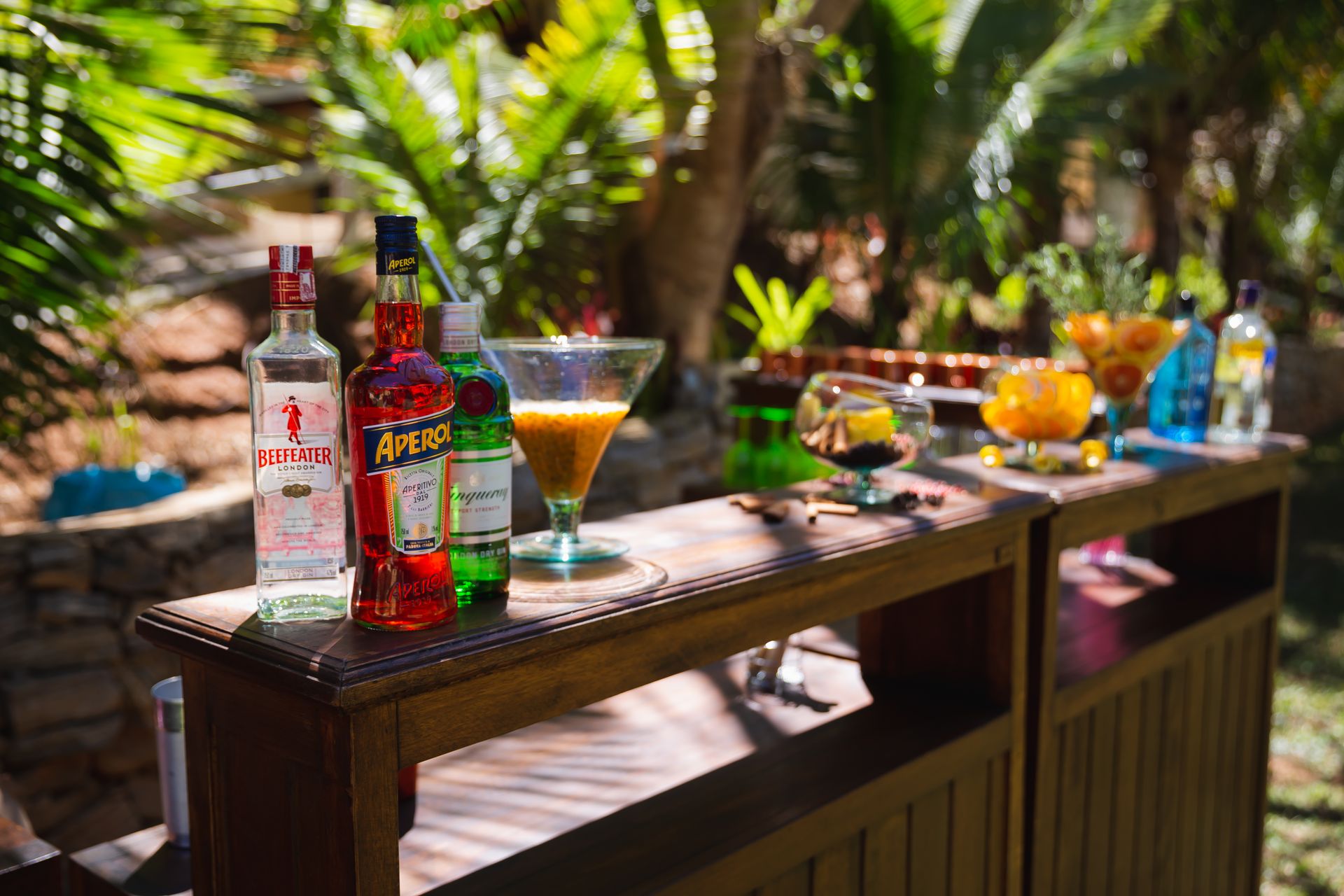 Outdoor mobile bar setup with cocktails and spirits at a private party in Palm Beach County